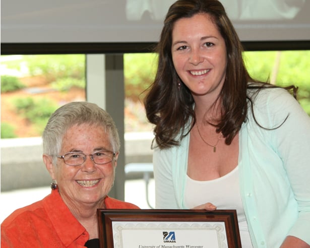 Professor emerita Mary Kay Alexander presents the award named after her to Ashley Rosati.