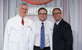MD/PhD student Peter Cruz-Gordillo, center, poses for a photo with Burncoat House mentor David Hatem, MD, left, and Cruz-Gordillo’s father, Peter R. Cruz. Cruz-Gordillo is originally from San Juan, Puerto Rico and grew up there and in Miami.