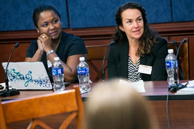 Ayesha Blackwell, from Amazon, and UMass Medical School’s Vanessa Paulman take questions from the audience at a panel discussion for congressional staffers hosted by the Council for Global Immigration.