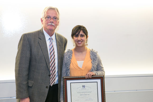 Dr. Carruthers and Faculty Award recipient Shruti Sharma, PhD
