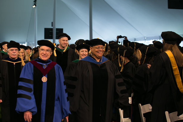 Faculty members George Witman, PhD, and Deborah Harmon Hines, PhD, enter during the processional.
