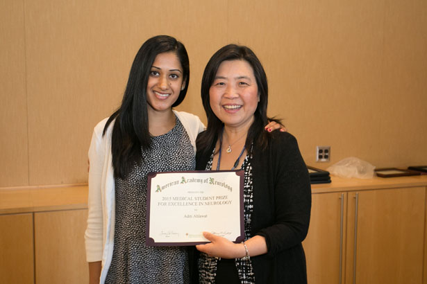 Aditi Ahlawat received the American Academy of Neurology Prize for Excellence in Neurology from Lan Qin, MD, PhD.