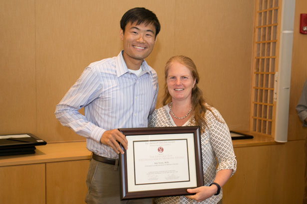 Shu Yang receives the Leonard Tow Humanism in Medicine Award from Suzana Makowski, MD. 