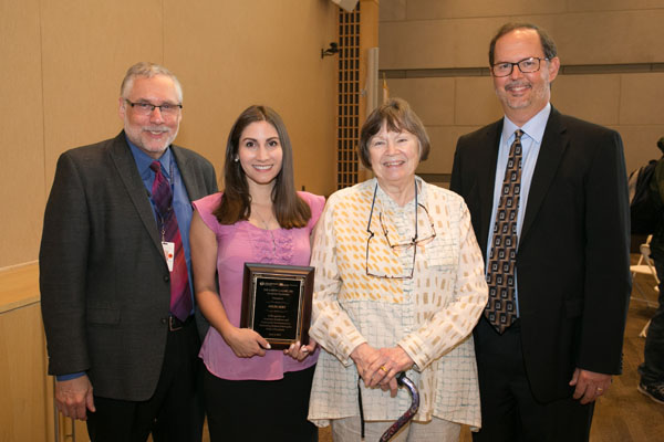 Aylin Sert (second from left) receives the Aaron Lazare Award for Psychiatry from Sheldon Benjamin, MD, (far left) Louise Lazare and Douglas M. Ziedonis, MD, MPH.