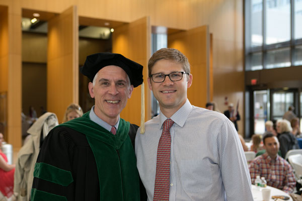 SOM graduate Dylan Perry (right) with Learning Community mentor David Hatem, MD
