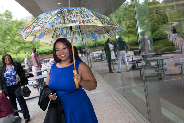 A little rain can’t dampen the spirits of GSBS graduate Lauren Powell.