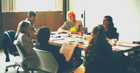 Macy Editorial Board members at work during their recent face-to-face meeting in Worcester.