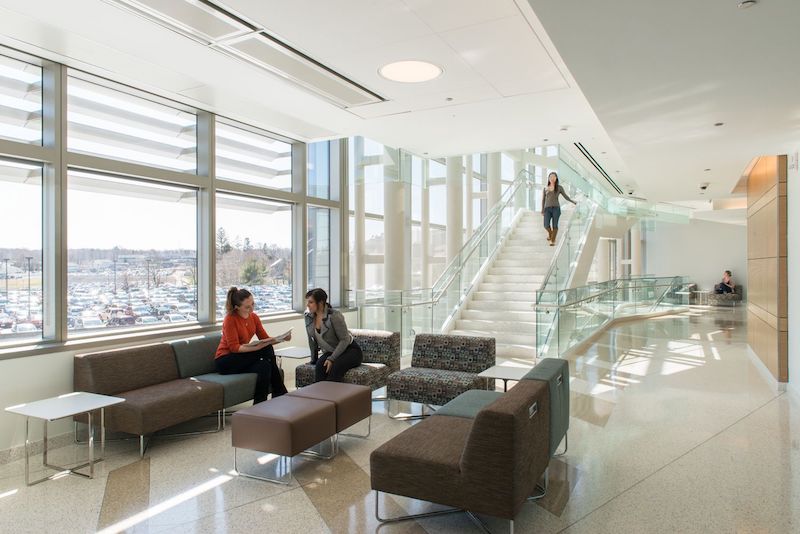 interior photo displaying students in lounge