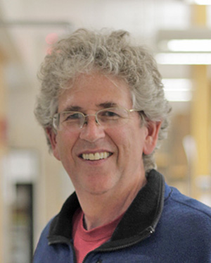 a headshot of Dr. Nick Rhind