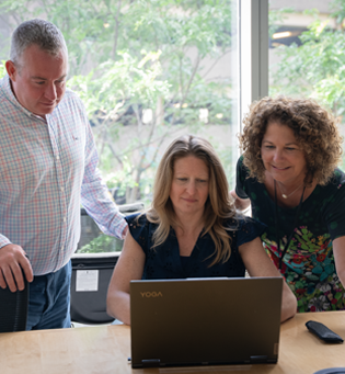 Graduates of the MS - Nursing and Interprofessional Leadership with director Mary Antonelli, PhD