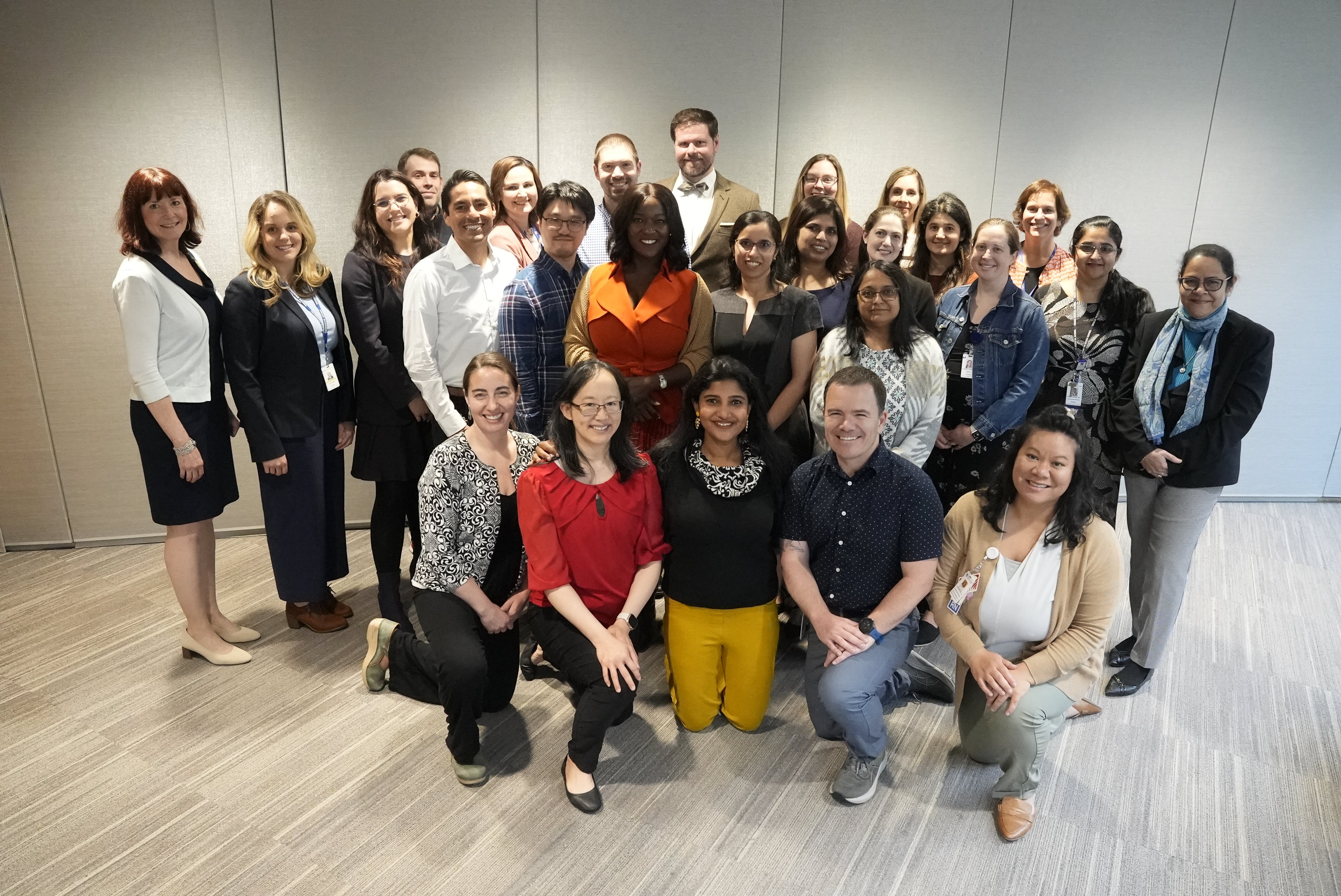 26 individuals from JFDP AY25 cohort smiling