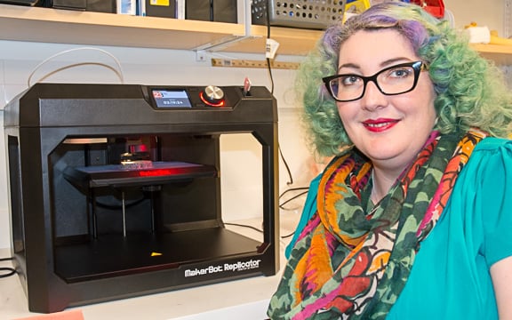 Yasmin Carter, PhD with 3D printer