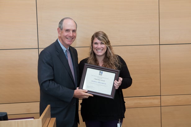 Chancellor Michael F. Collins presents Shawna Guillemette with the Chancellor’s Award.