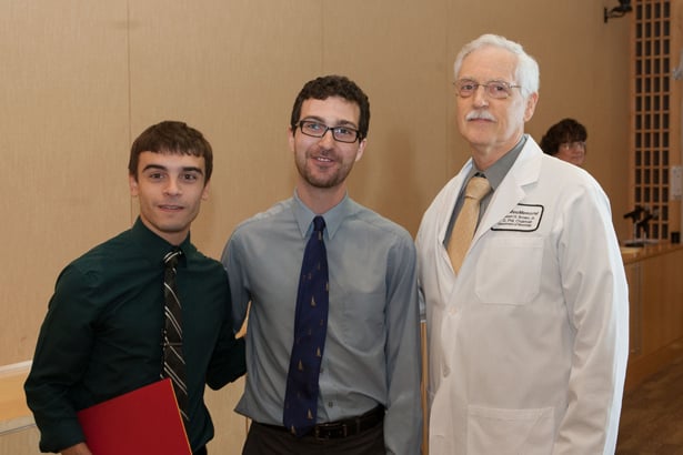 From left, Christopher Perrone and Seth Levin with Robert H. Brown Jr., DPhil, MD.