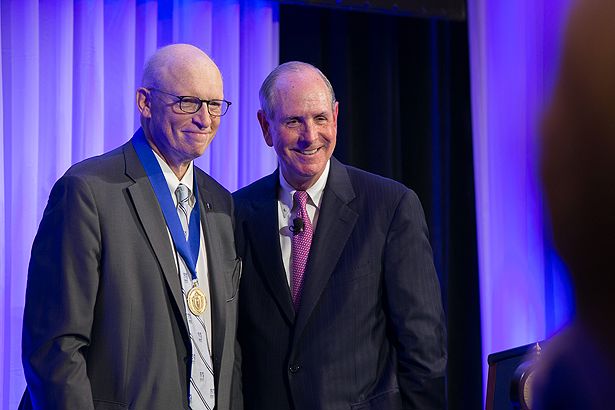 Michael P. Hirsh is awarded the Chancellor’s Medal for Distinguished Service.