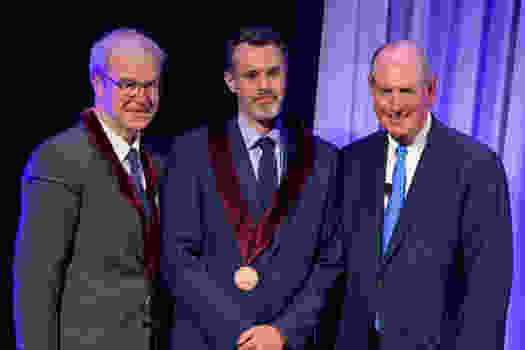 Provost Flotte, David McManus, MD, and Chancellor Collins