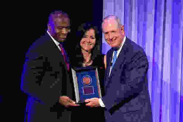 Imoigele Aisuku, MD, Milagros Rosal,PhD, and Chancellor Collins