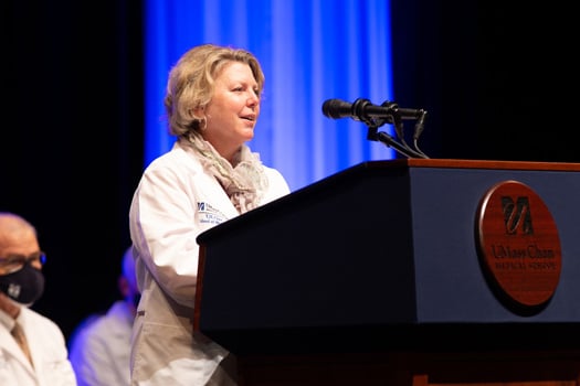 Anne C. Larkin, MD, speaks to the Class of 2024. Dr. Larkin performed an appendectomy between ceremonies.