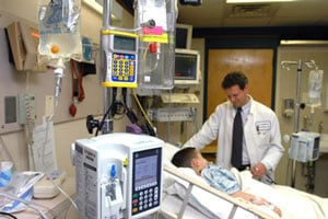 Critical care specialist Scot Bateman, MD,  in the pediatric intensive care unit