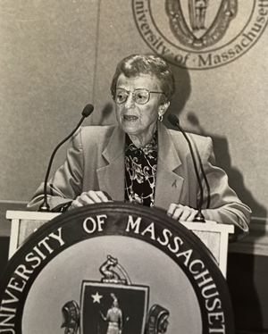 Lillian Goodman speaking at a podium at UMass Medical School.