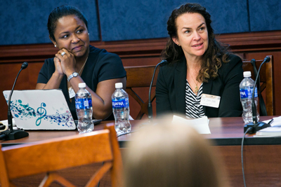 Ayesha Blackwell, from Amazon, and UMass Medical School’s Vanessa Paulman take questions from the audience at a panel discussion for congressional staffers hosted by the Council for Global Immigration.