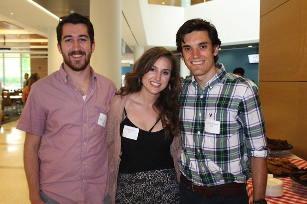 First-year MD/PhD students Jordan Smith (center) and Nicholas Peterson (right) with Smith’s husband Phil Culbertson