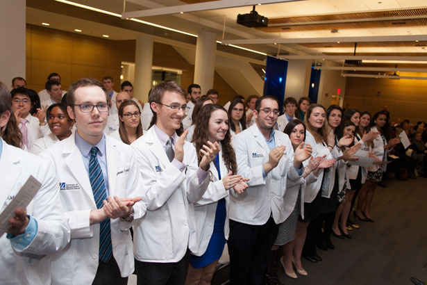 Students applaud Second Year Oath keynote speaker David Clive, MD.