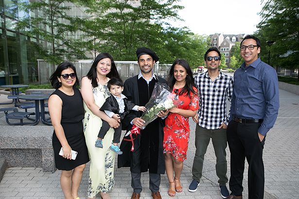 GSBS graduate Diwash Acharya (center) with family and friends