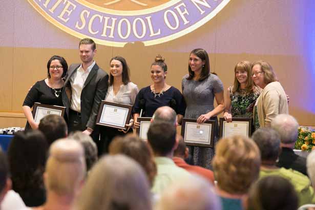 (From left) Cecily Kulsick, Steven Purcell, Jacquelyn Walsh, Jamie Kerr, Amanda Griffin and Natalie Fremont-Smith accept awards from Beth Keating, MS