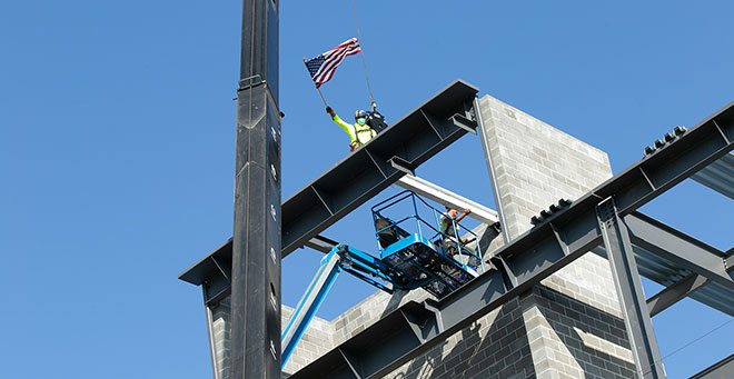 Final beam of new VA clinic placed during UMass Medical School ceremony