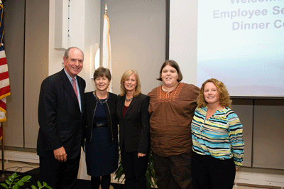 (from left) Chancellor Collins presented the 2015 Chancellor’s Award for Advancing the UMMS Mission to Work Without Limits Employer Engagement Team members Alexis Henry, ScD, Kathy Petkauskos, Megan Northup and Kathy Muhr.